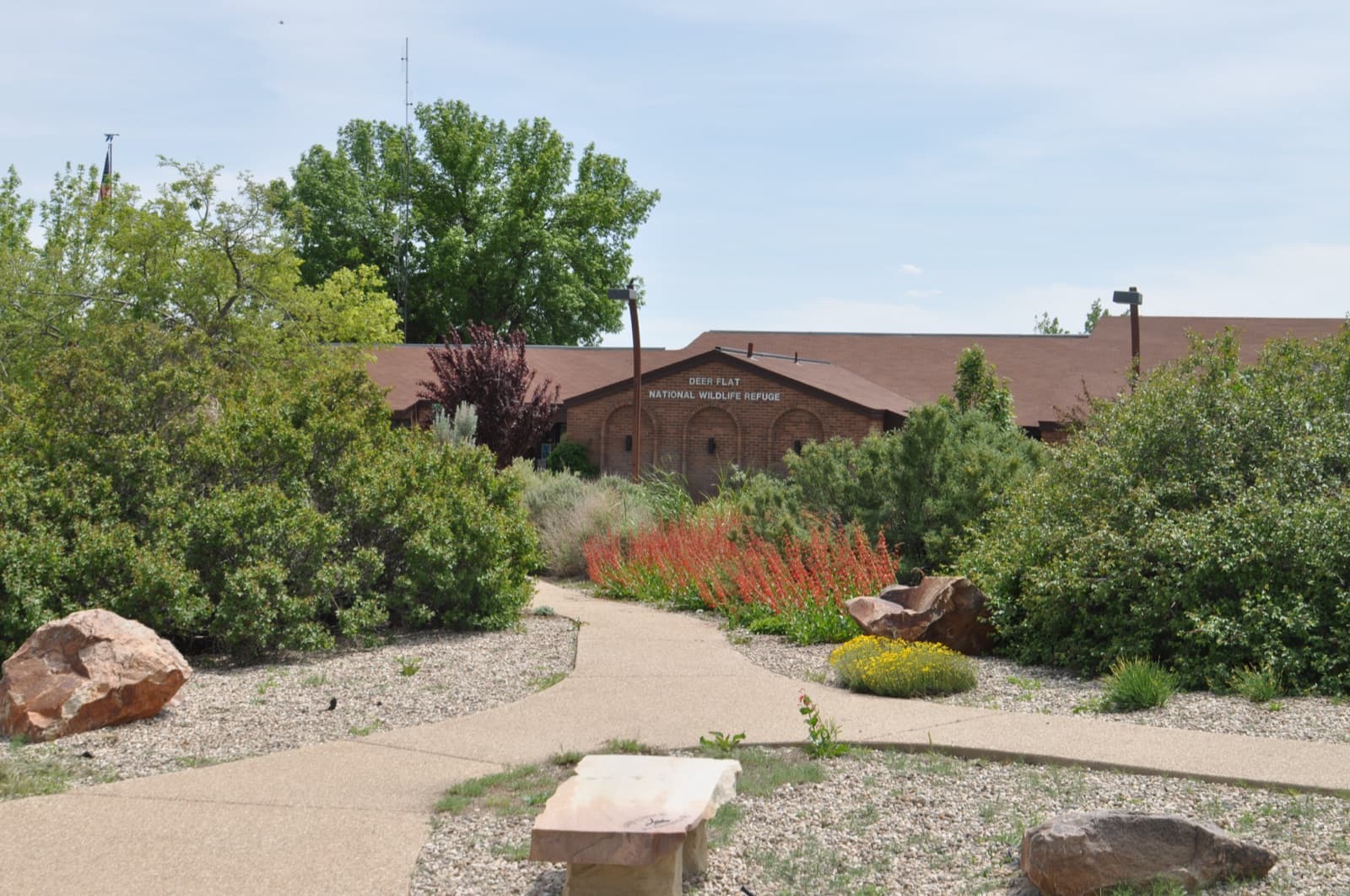 A path through xeriscape landscaping leading to the Deer Flat National Wildlife Refuge visitor center