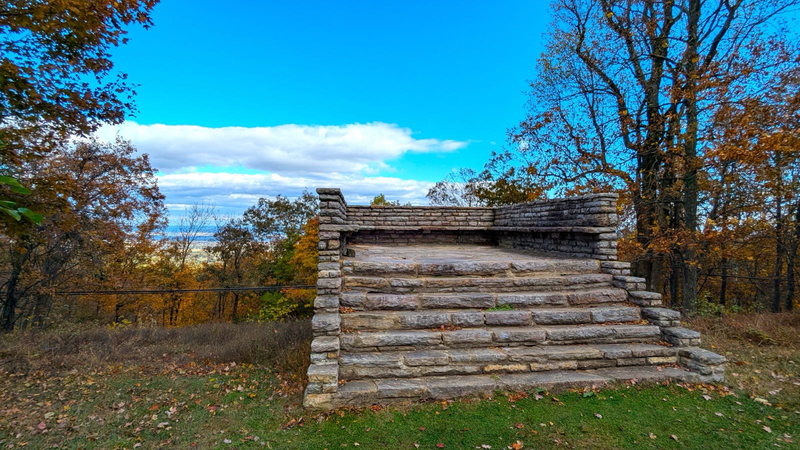 Stone steps lead to the South Frederick overlook amid autumn trees at Gambrill State Park